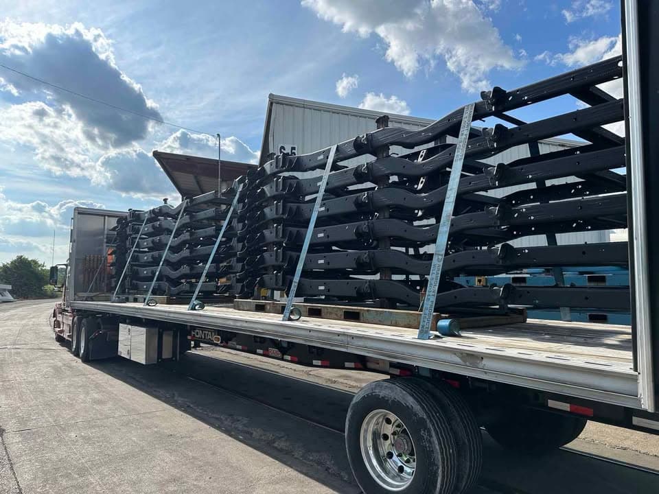 Truck and trailer parked at a customer site